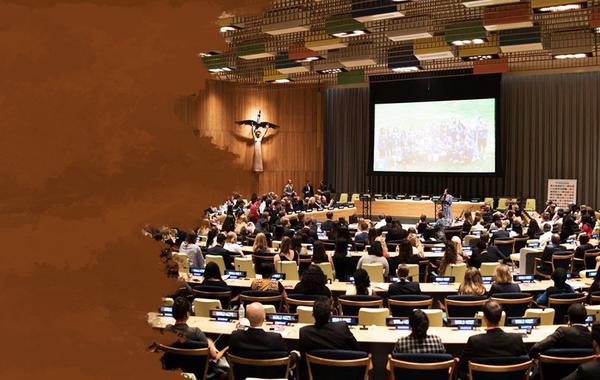 Giving a speech at the United Nations